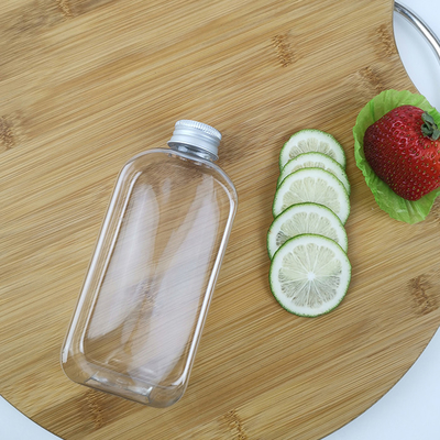 Επίπεδα μπουκάλια νερό 300ml PLA με τα πλαστικά μπουκάλια καταφερτζήδων γάλακτος χυμού καλυμμάτων