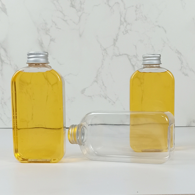 Τα επίπεδα πλαστικά μπουκάλια της PET 400ml με τα καλύμματα καθαρίζουν το πλαστικό γάλα χυμού βάζων