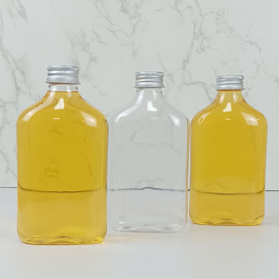 350ml τα βάζα κεφαλής κοχλίου καθαρίζουν τα πλαστικά μπουκάλια χυμού της PET με τα καλύμματα